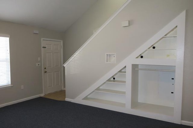 view of carpeted foyer