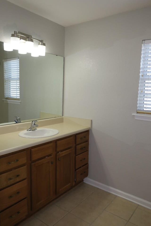 bathroom featuring vanity and tile patterned flooring