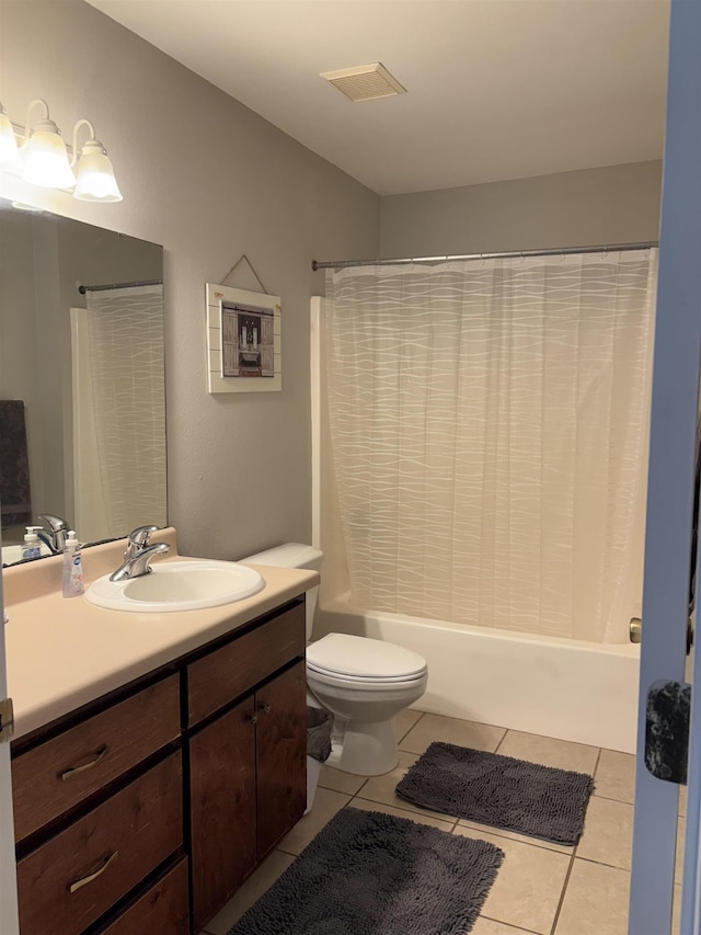 29 Chippewa Rd, Crawfordville, FL 32327 - full bath featuring vanity, tile patterned floors, and shower / bath combo with shower curtain