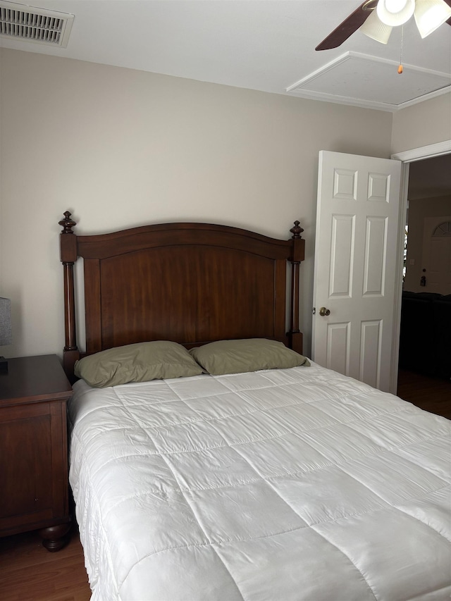 29 Chippewa Rd, Crawfordville, FL 32327 - bedroom featuring wood finished floors, attic access, and ceiling fan