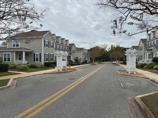4064 Colleton Ct, Tallahassee, FL 32311 - view of asphalt road with curbs, sidewalks, and a residential view