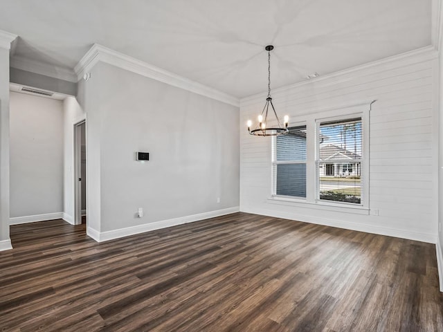 unfurnished dining area featuring crown molding, visible vents, baseboards, dark wood finished floors, and an inviting chandelier