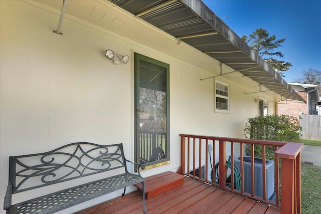 wooden terrace with central air condition unit