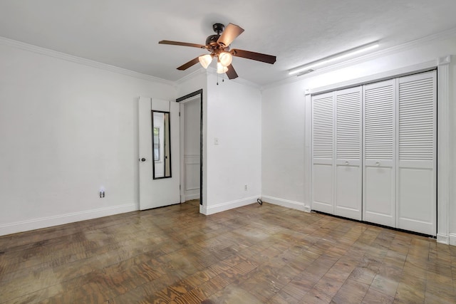 3200 Tallavana Trl, Havana, FL 32333 - unfurnished bedroom featuring crown molding, a ceiling fan, and a closet