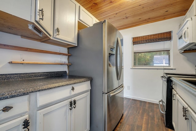 3200 Tallavana Trl, Havana, FL 32333 - kitchen featuring wooden ceiling, range with electric cooktop, white microwave, dark wood-type flooring, and open shelves