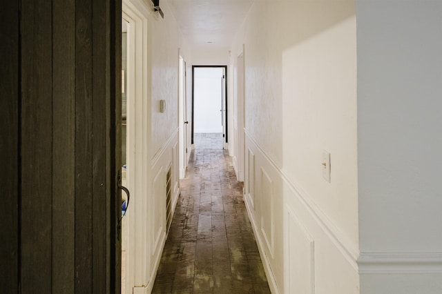 3200 Tallavana Trl, Havana, FL 32333 - hallway with a decorative wall and dark wood-style flooring