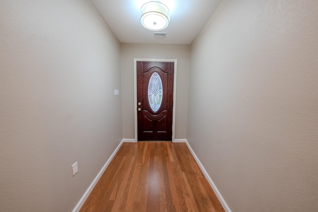 entryway featuring hardwood / wood-style flooring