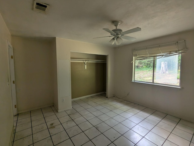 2218 Amelia Cir, Tallahassee, FL 32304 - unfurnished bedroom featuring light tile patterned floors, a closet, ceiling fan, and visible vents