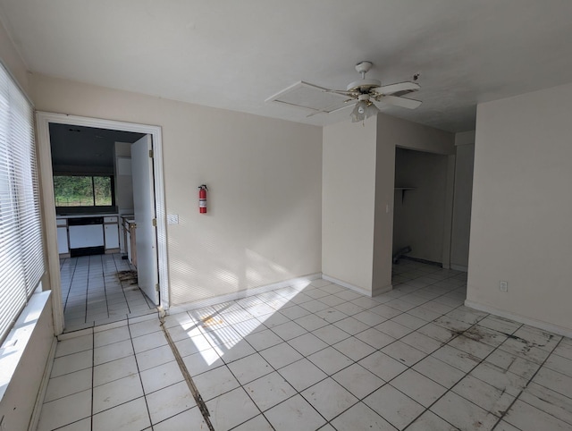 2218 Amelia Cir, Tallahassee, FL 32304 - empty room with light tile patterned floors, baseboards, and ceiling fan