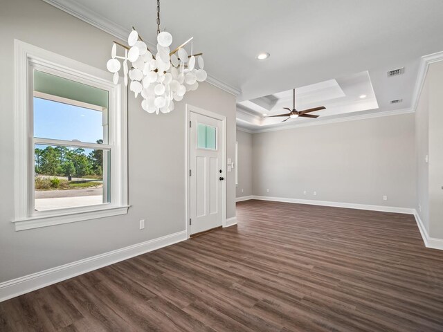 240 Ante Beppum Loop, Carrabelle, FL 32322 - spare room featuring ornamental molding, a tray ceiling, dark wood-type flooring, baseboards, and recessed lighting