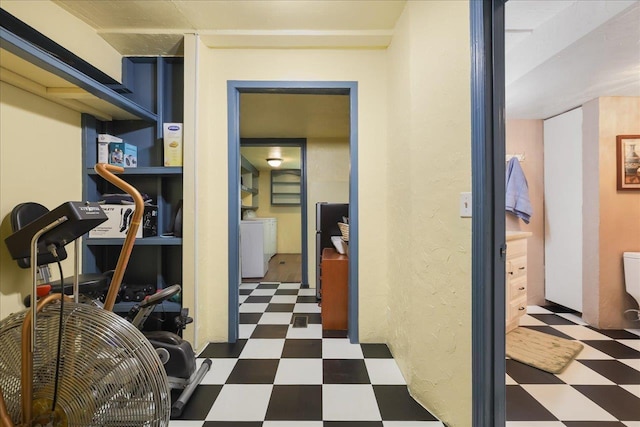 698 Liberty Rd, Quincy, FL 32351 - workout room featuring tile patterned floors and washer / dryer