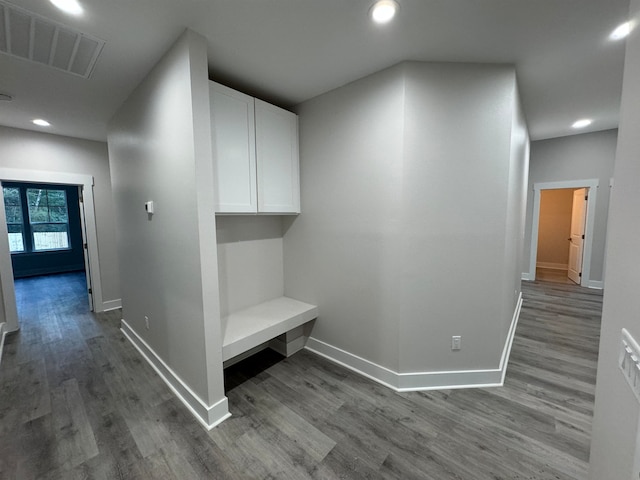 corridor featuring hardwood / wood-style floors