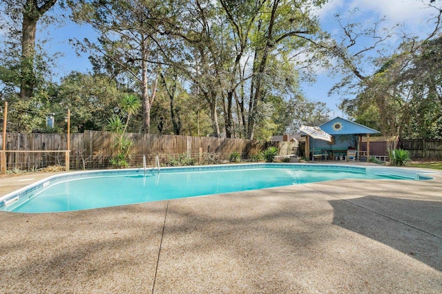 view of swimming pool featuring a patio