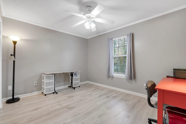 office with crown molding, ceiling fan, light hardwood / wood-style flooring, and a textured ceiling