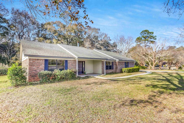 single story home with a front yard