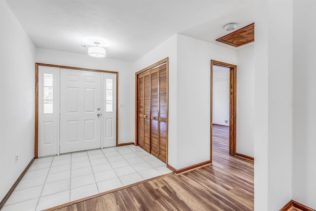 entryway with light hardwood / wood-style flooring