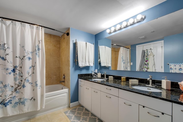 300 S Duval St # 508, Tallahassee, FL 32301 - bathroom with shower / tub combo, tile patterned floors, double vanity, and baseboards