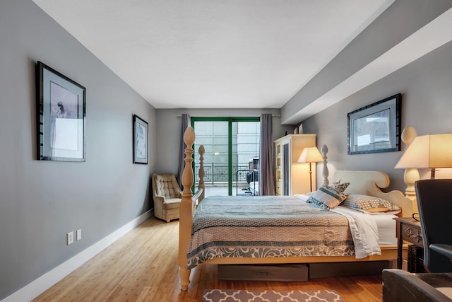 300 S Duval St # 508, Tallahassee, FL 32301 - bedroom featuring wood finished floors and baseboards