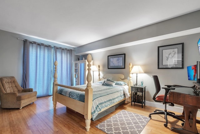 300 S Duval St # 508, Tallahassee, FL 32301 - bedroom featuring wood finished floors and baseboards