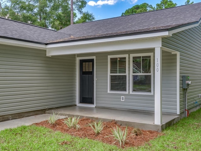45 Sioux Trl, Crawfordville, FL 32327 - entrance to property with roof with shingles and covered porch
