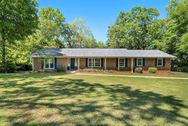 3024 S Shamrock, Tallahassee, FL 32309 - ranch-style house featuring brick siding and a front yard