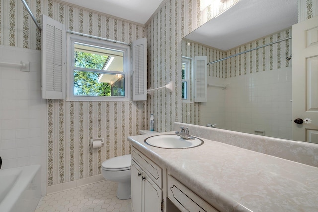 3024 S Shamrock, Tallahassee, FL 32309 - bathroom featuring tile patterned flooring, vanity, tub / shower combination, toilet, and wallpapered walls