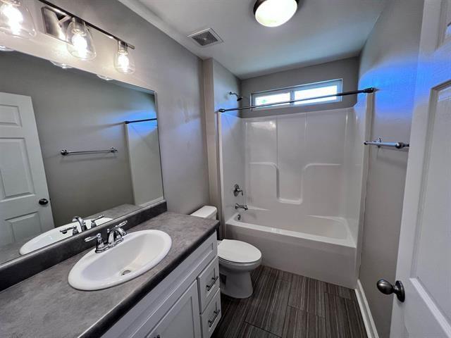 4783 Cypress Brooke Way Unit 4783 & 4787, Tallahassee, FL 32311 - full bathroom featuring vanity and washtub / shower combination
