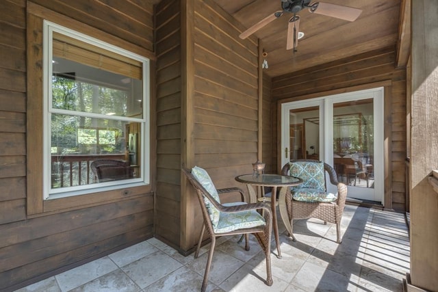 view of patio / terrace featuring ceiling fan