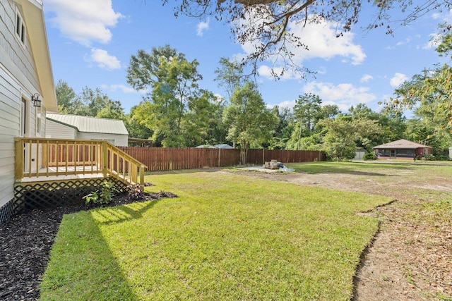 view of yard featuring a deck