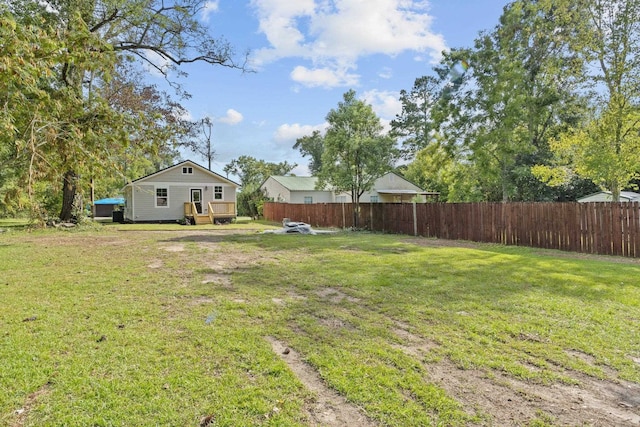 view of yard with a deck