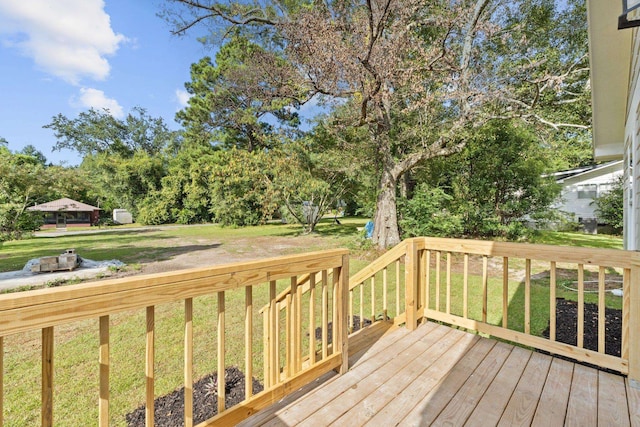 deck featuring a lawn