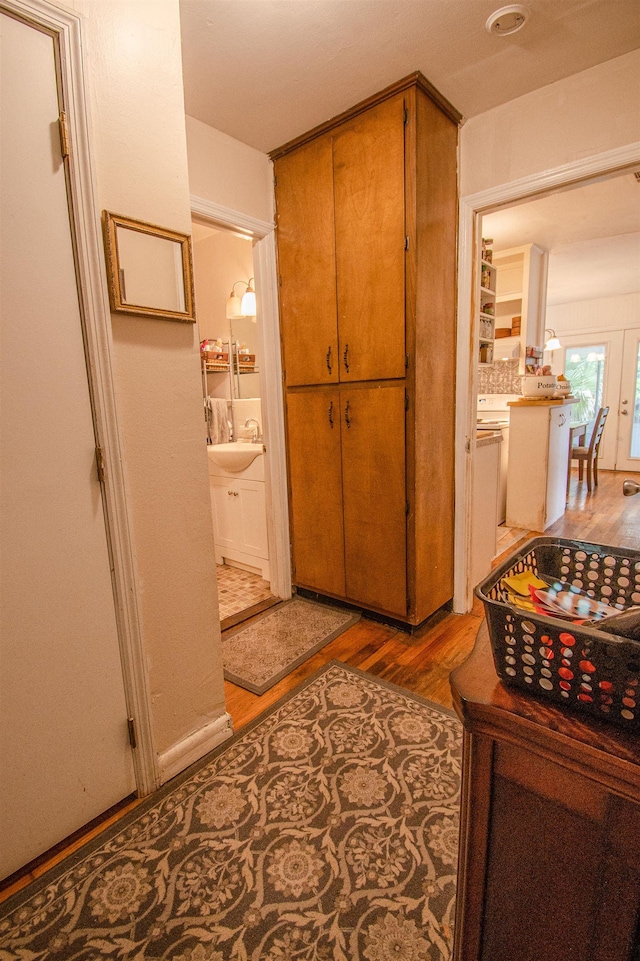 319 Gaile Ave, Tallahassee, FL 32305 - hall featuring a sink and wood finished floors
