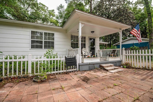 319 Gaile Ave, Tallahassee, FL 32305 - view of patio with a porch and fence