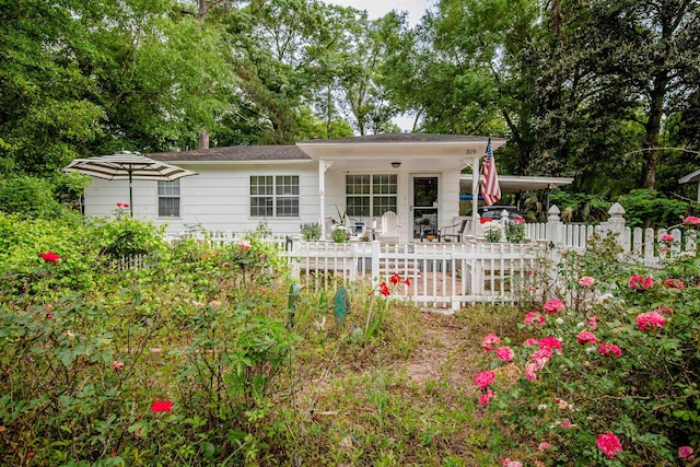 319 Gaile Ave, Tallahassee, FL 32305 - view of front of home featuring fence and a carport
