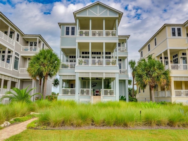 rear view of property featuring a balcony