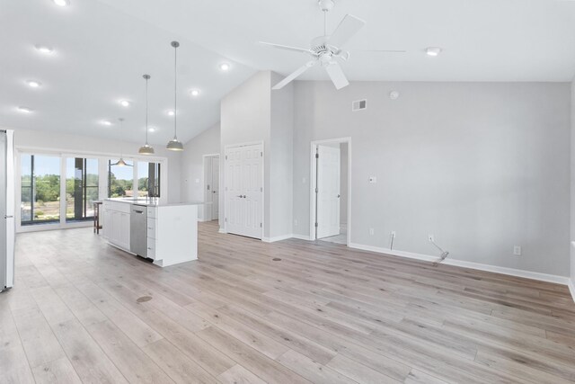 82 Royster Dr, Crawfordville, FL 32327 - unfurnished living room featuring ceiling fan, baseboards, high vaulted ceiling, light wood finished floors, and recessed lighting