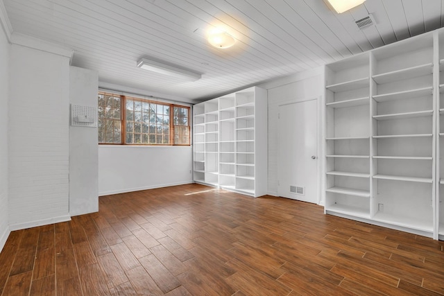 unfurnished room featuring wood ceiling and dark wood-type flooring