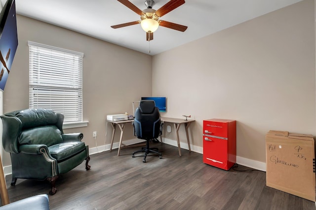 office with ceiling fan and dark hardwood / wood-style flooring