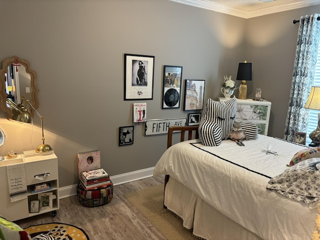 322 Graceland Rd, Chattahoochee, FL 32324 - bedroom with baseboards, wood finished floors, and crown molding