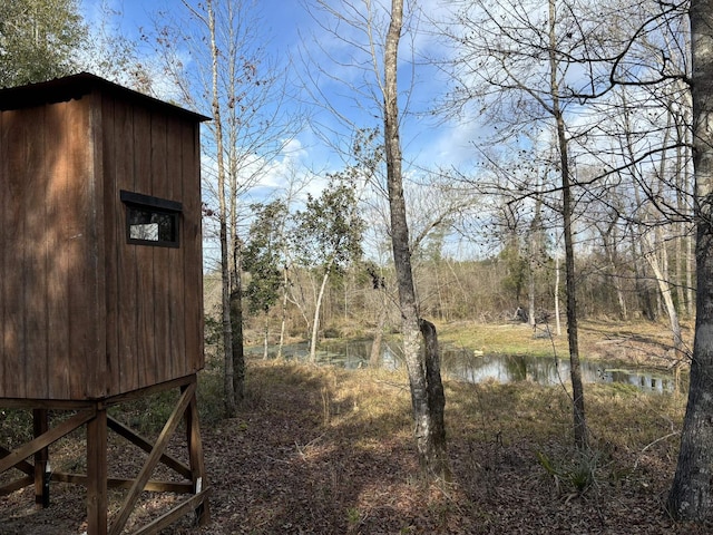 322 Graceland Rd, Chattahoochee, FL 32324 - view of yard featuring an outdoor structure and a water view