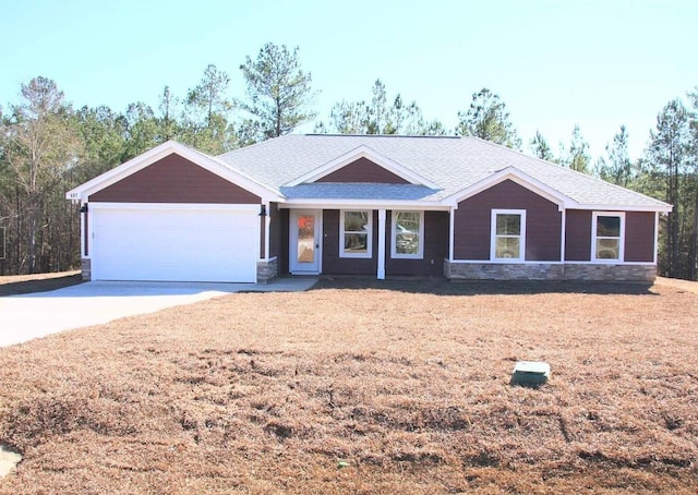 ranch-style home featuring a garage