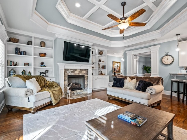 living room with ceiling fan, decorative columns, dark hardwood / wood-style floors, coffered ceiling, and ornamental molding