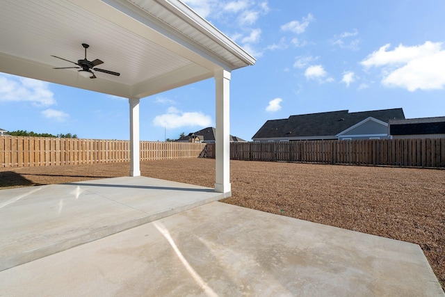 view of patio featuring ceiling fan