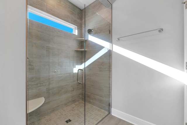 bathroom featuring walk in shower