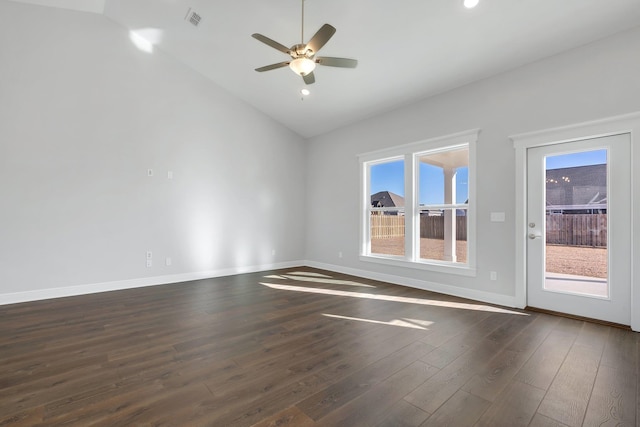 unfurnished room featuring dark wood-type flooring, ceiling fan, and vaulted ceiling