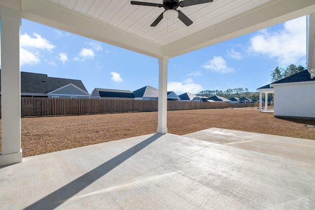 view of patio featuring ceiling fan