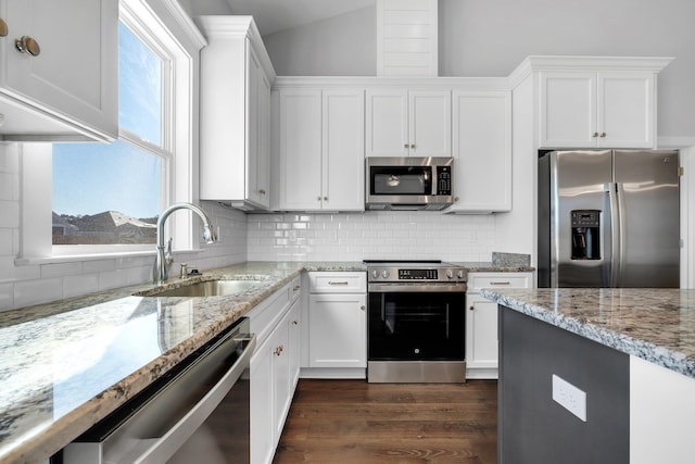 kitchen featuring white cabinetry, appliances with stainless steel finishes, and sink