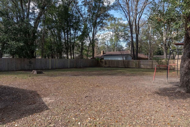 view of yard featuring fence