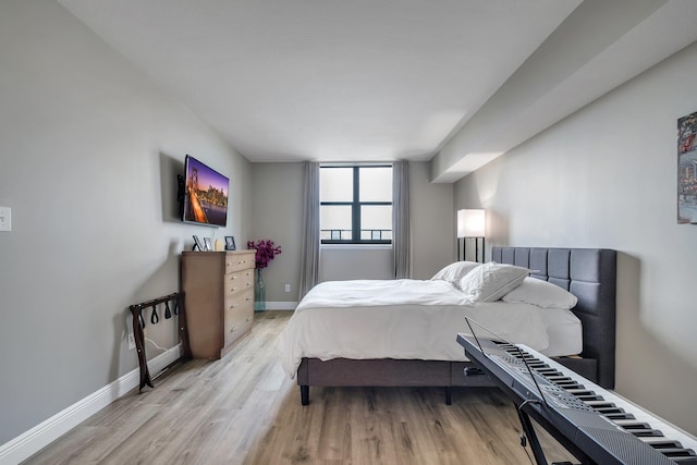 300 S Duval St # 1408, Tallahassee, FL 32301 - bedroom with wood finished floors and baseboards