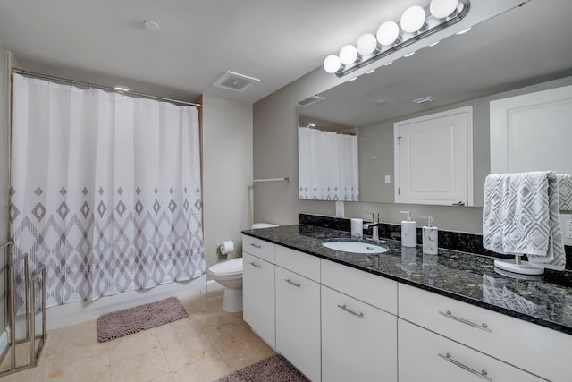 300 S Duval St # 1408, Tallahassee, FL 32301 - bathroom featuring toilet, vanity, and shower / bath combo with shower curtain